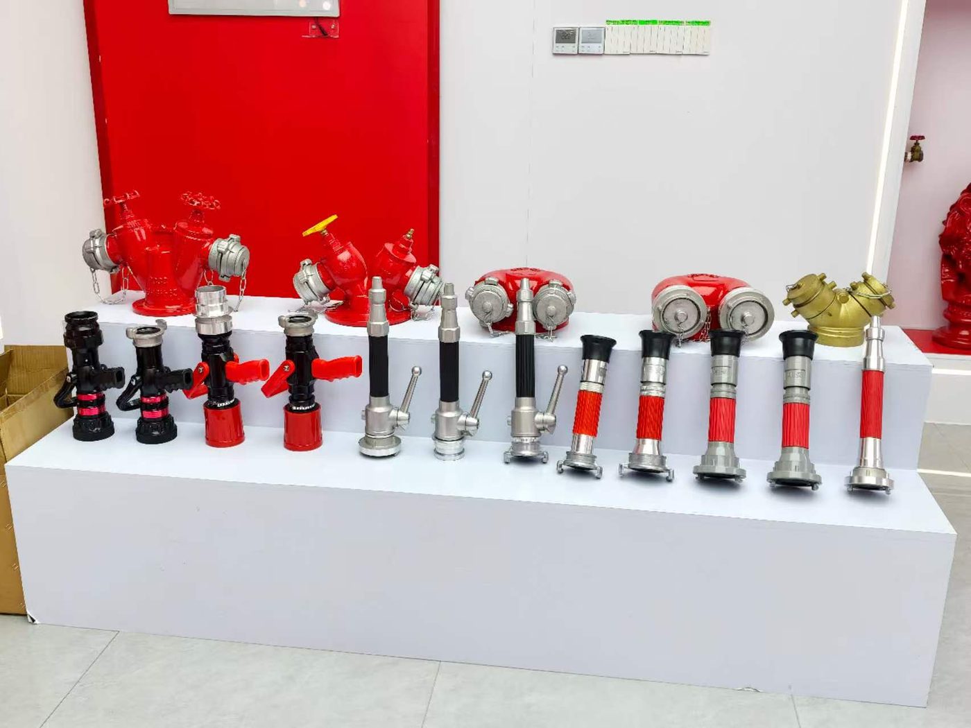Fire hose nozzles and couplings display