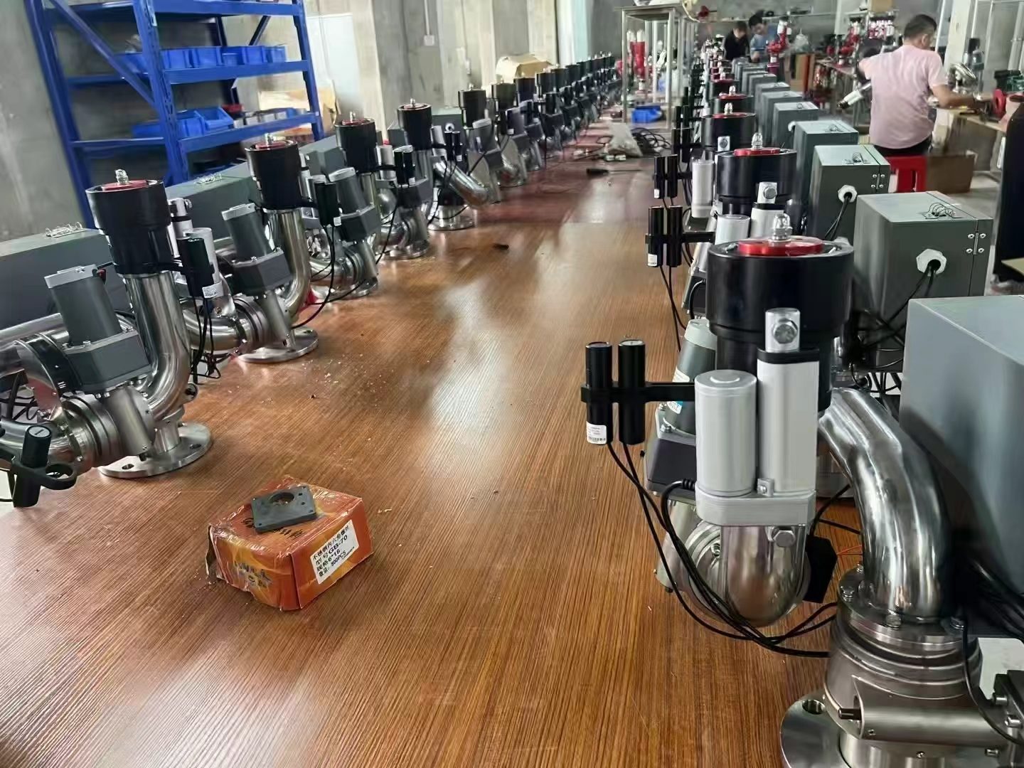 Fire monitor assembly line with finished units