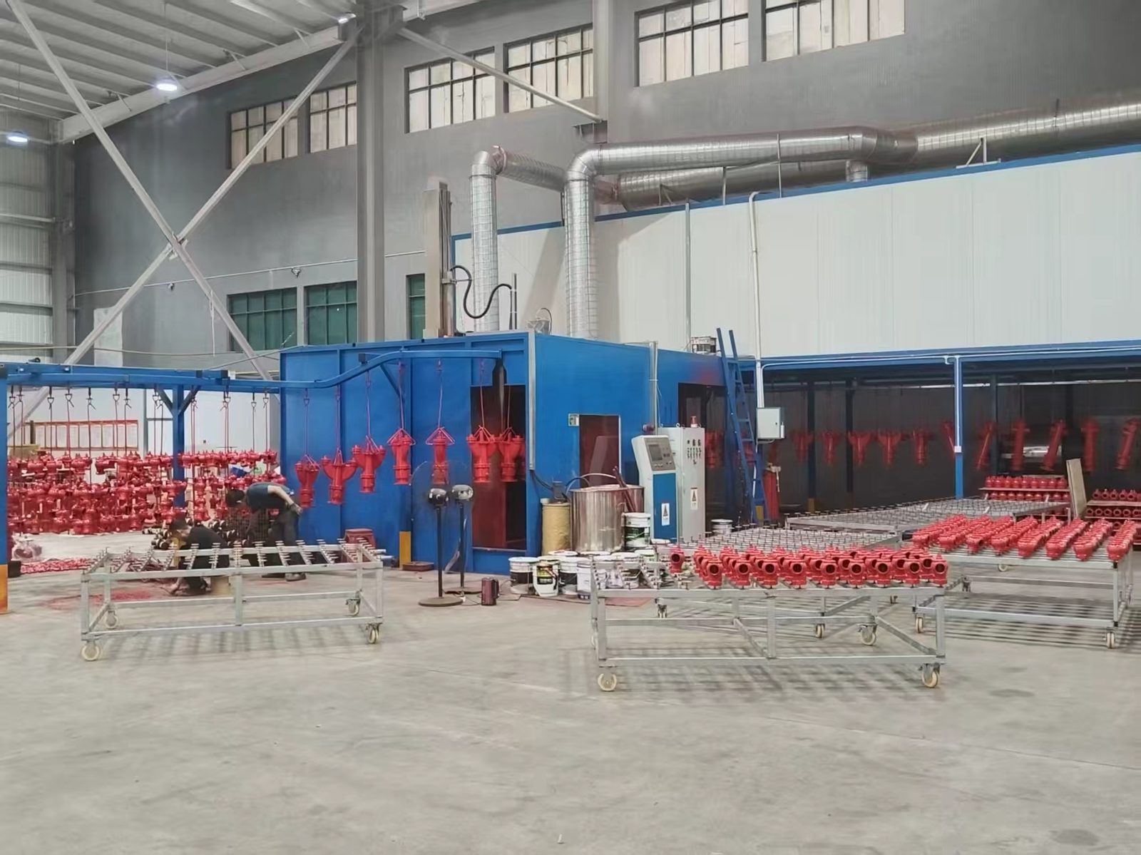 Powder coating line for hydrant castings